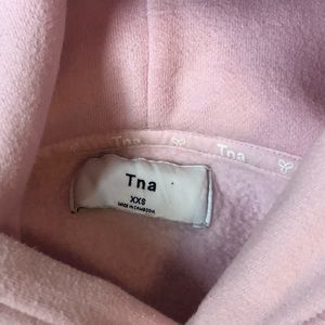 Baby pink tna hoodie